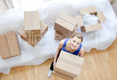 Beautiful woman holding a box