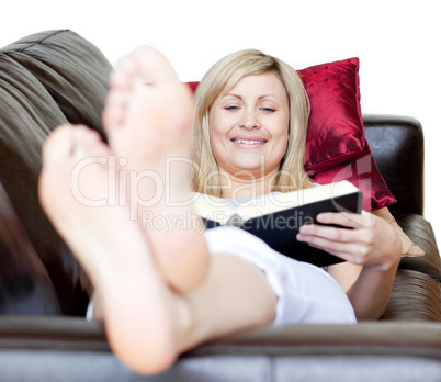 Attractive woman holding a book