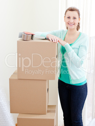 Beautiful woman closing various boxes