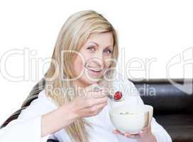 Cheerful woman having a breakfast