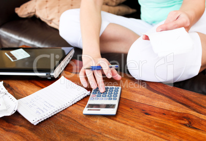 Beautiful woman doing accountancy