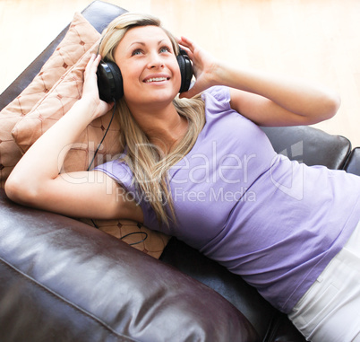 Happy woman using headphones