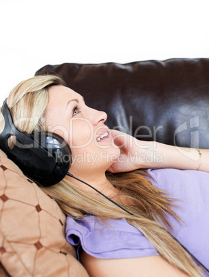 Cute woman using headphones