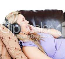 Relaxed woman using headphones