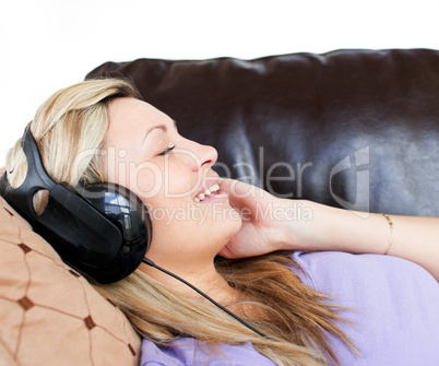 Smiling woman using headphones