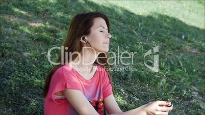 Young woman listening to music Beautiful girl