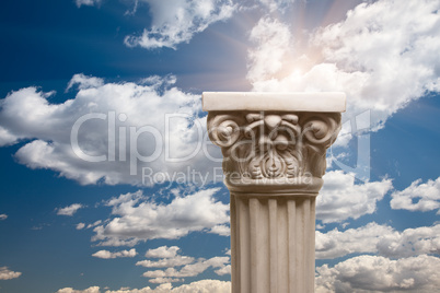 Ancient Replica Column Pillar Over Clouds and Sun
