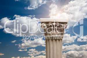Ancient Replica Column Pillar Over Clouds and Sun