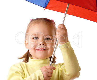 Cute child with colorful umbrella