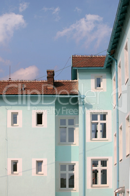 Exterior of building with red roof