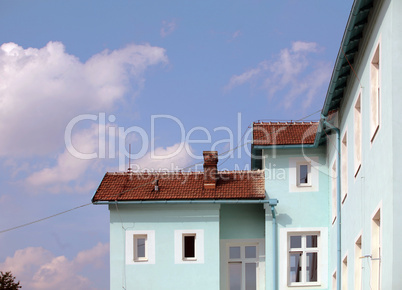 Exterior of building with red roof