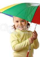 Cute child catching raindrops under umbrella