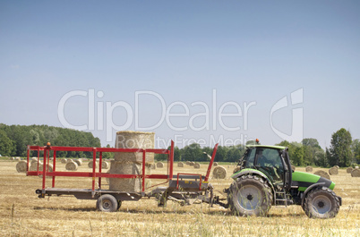 Tractor on hay balls
