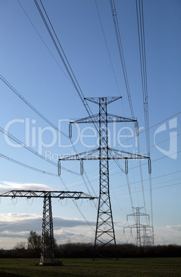 Electric pylons in field