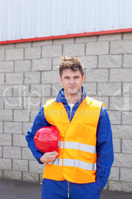 Smiling male engineer standing