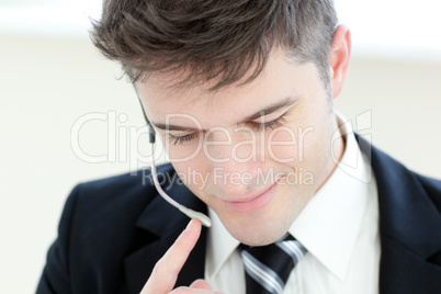 Portrait of a smiling businessman talking to a customer