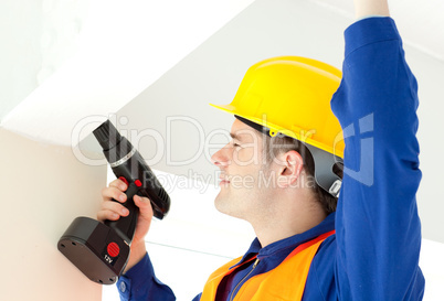 Busy electrician repairing a power plan