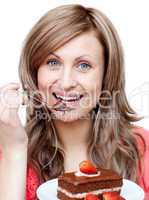 Charming woman eating a cake