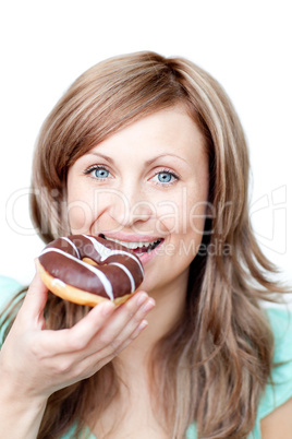 Happy woman eating a cake