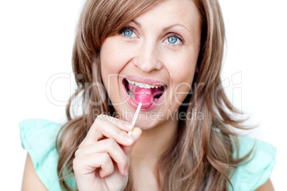 Radiant woman holding a lollipop