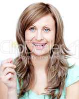 Beautiful woman holding a lollipop
