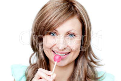 Attractive woman holding a lollipop