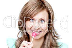 Attractive woman holding a lollipop
