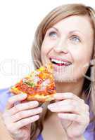 Cheerful woman holding a pizza