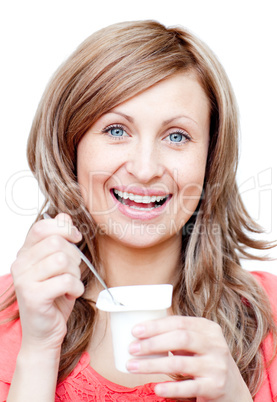 Beautiful woman eating a yogurt