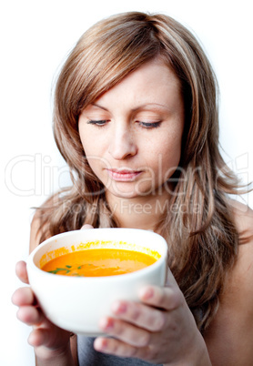 Beautiful woman holding a soup bowl