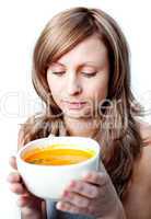 Beautiful woman holding a soup bowl