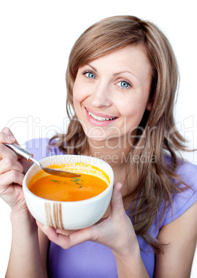 Lively woman holding a soup bowl