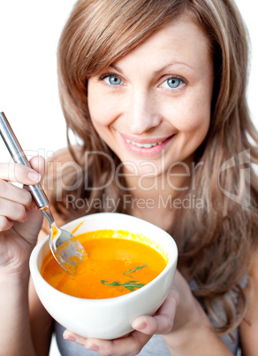 Cute woman holding a soup bowl