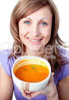 Happy woman holding a soup bowl