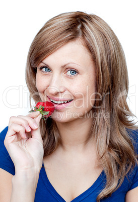 Radiant woman eating strawberries