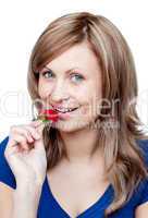 Radiant woman eating strawberries