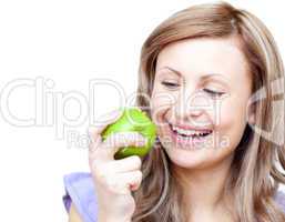 Happy woman holding an apple