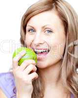 Beautiful woman holding an apple
