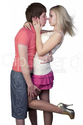 Man and woman posing on a white background