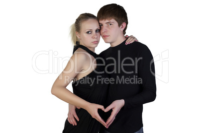 Boy and girl posing on a white background