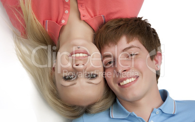 Portrait of boy and girl on a white background