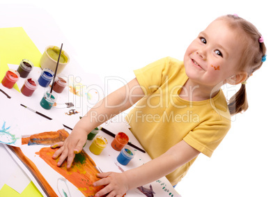 Cute child paint using hands