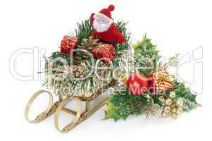Santa Claus and holly ornament