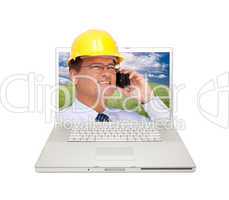 Laptop and Man with Hard Hat on Cell Phone