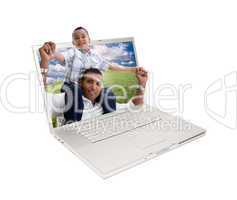 Happy Hispanic Father and Son in Laptop Screen