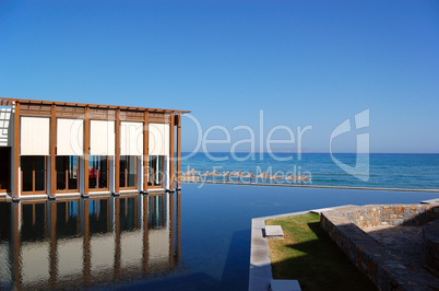 Restaurant, swimming pool and beach of modern luxury hotel, Cret