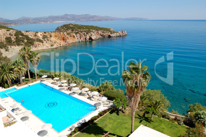 Swimming pool at the beach of luxury hotel, Crete, Greece