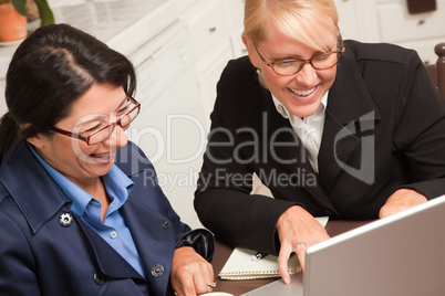 Businesswomen Working on the Laptop