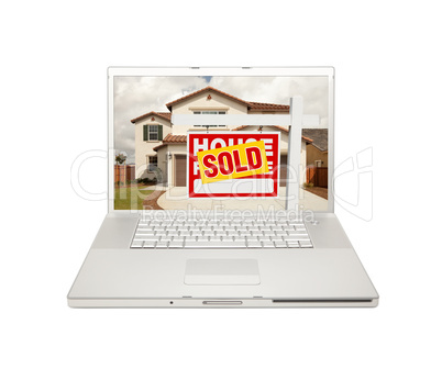 Sold For Sale Real Estate Sign on Laptop