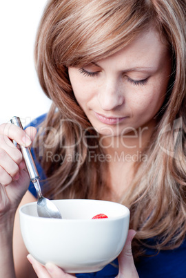 Beautiful woman eating cereals
